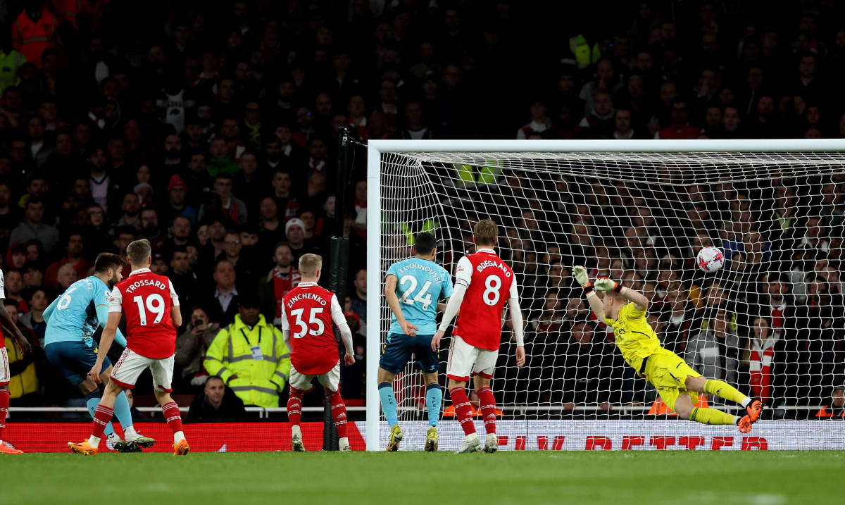 Southampton defender Duje Caleta-Car pictured (left) scoring a goal during his team's away game at Arsenal in April 2023